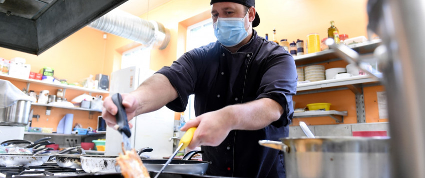 Person preparing food, illustrative picture