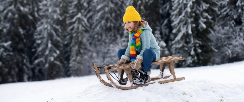 Illustrative  child on a sled