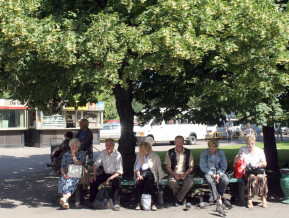 People sitting on the bench, illustrative picture