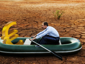 Man in a boat with money, illustrative picture