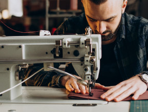 Illustrative photo men sewing