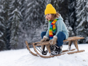 Illustrative  child on a sled